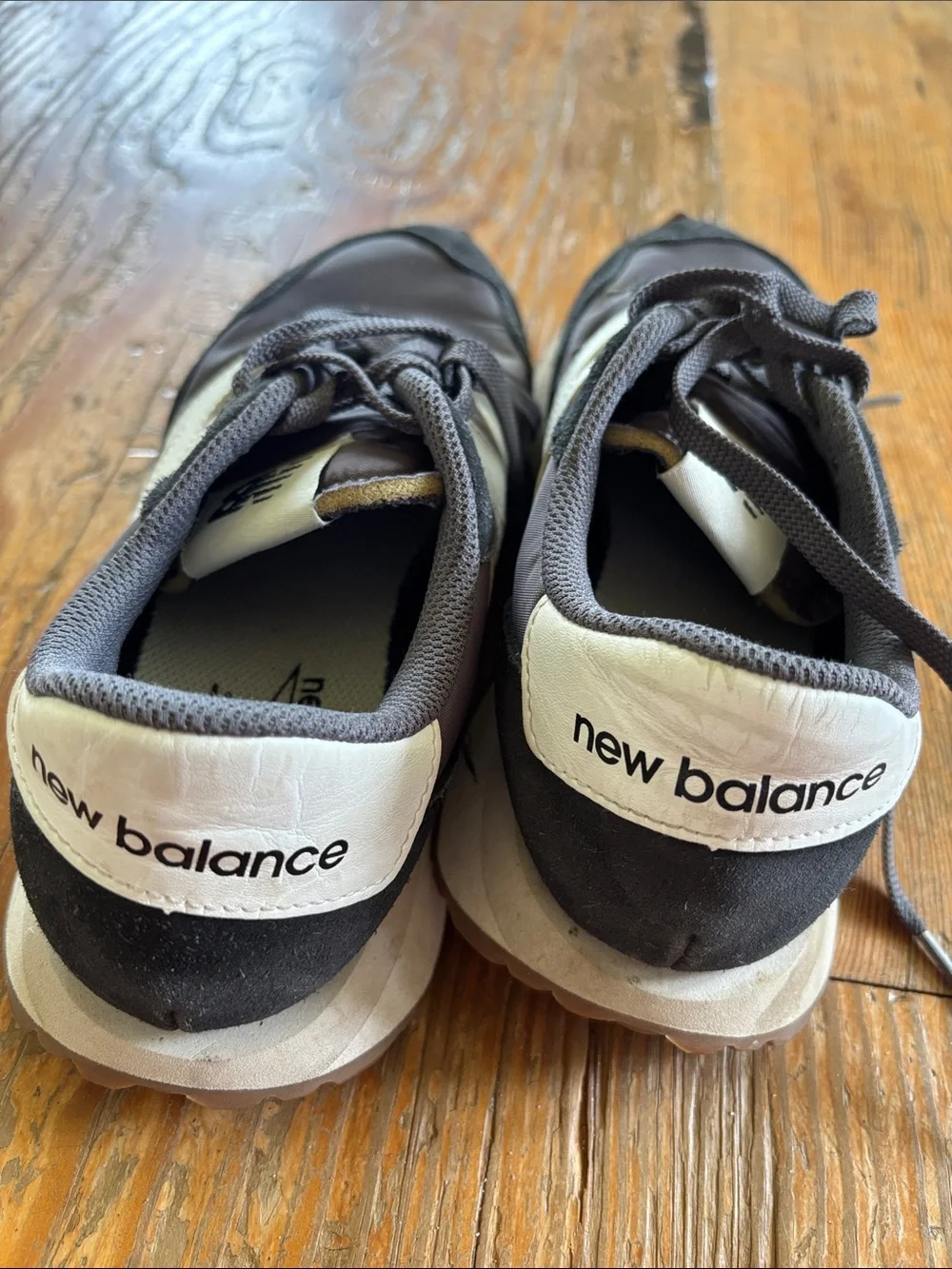 New Balance Women's 237 black and White Runner Sneakers